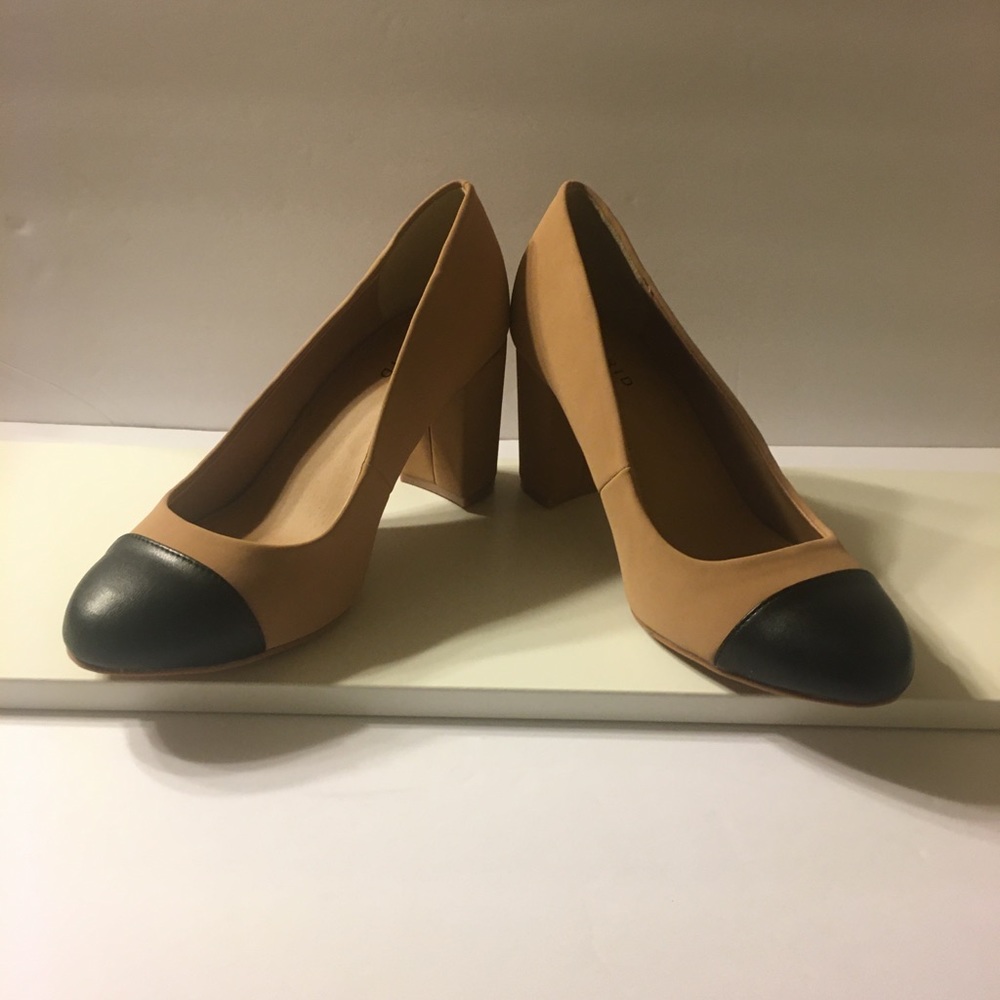 torrid. nude and black toe heels